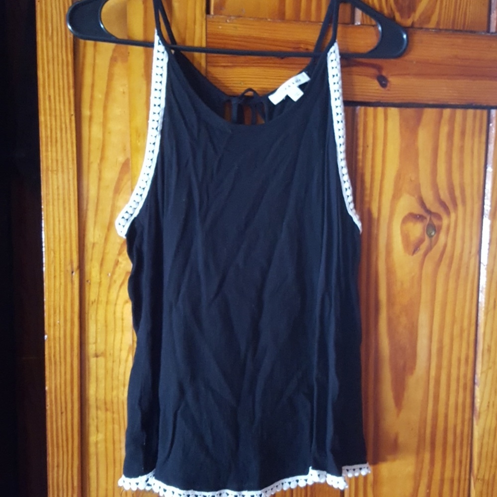 Black and white tank, ties at the neck in the back